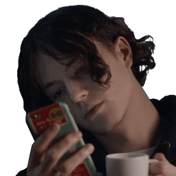 bladee looking at phone