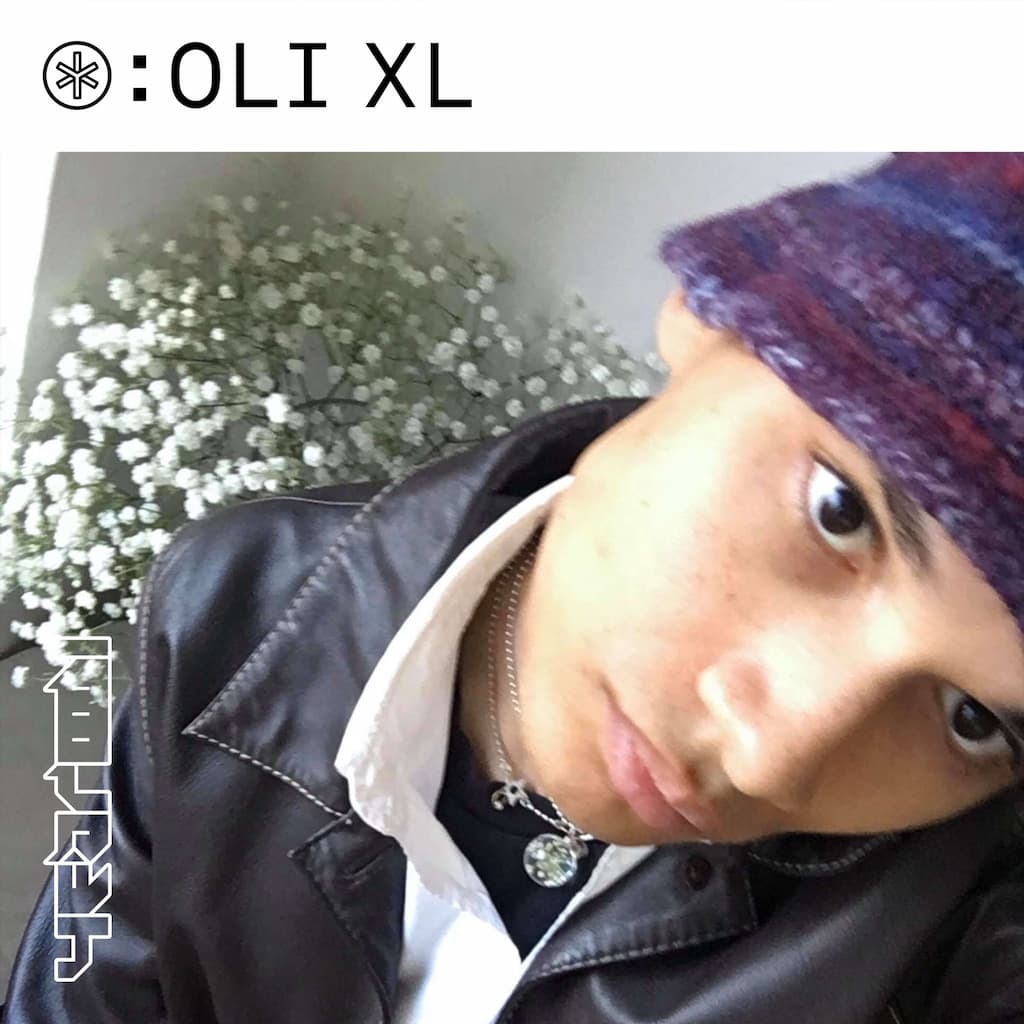 oli xl in spring/autumn-appropros outfit, a la selfie, looking into the camera, dark brown eyes; additional styling around the image for use as playlist cover